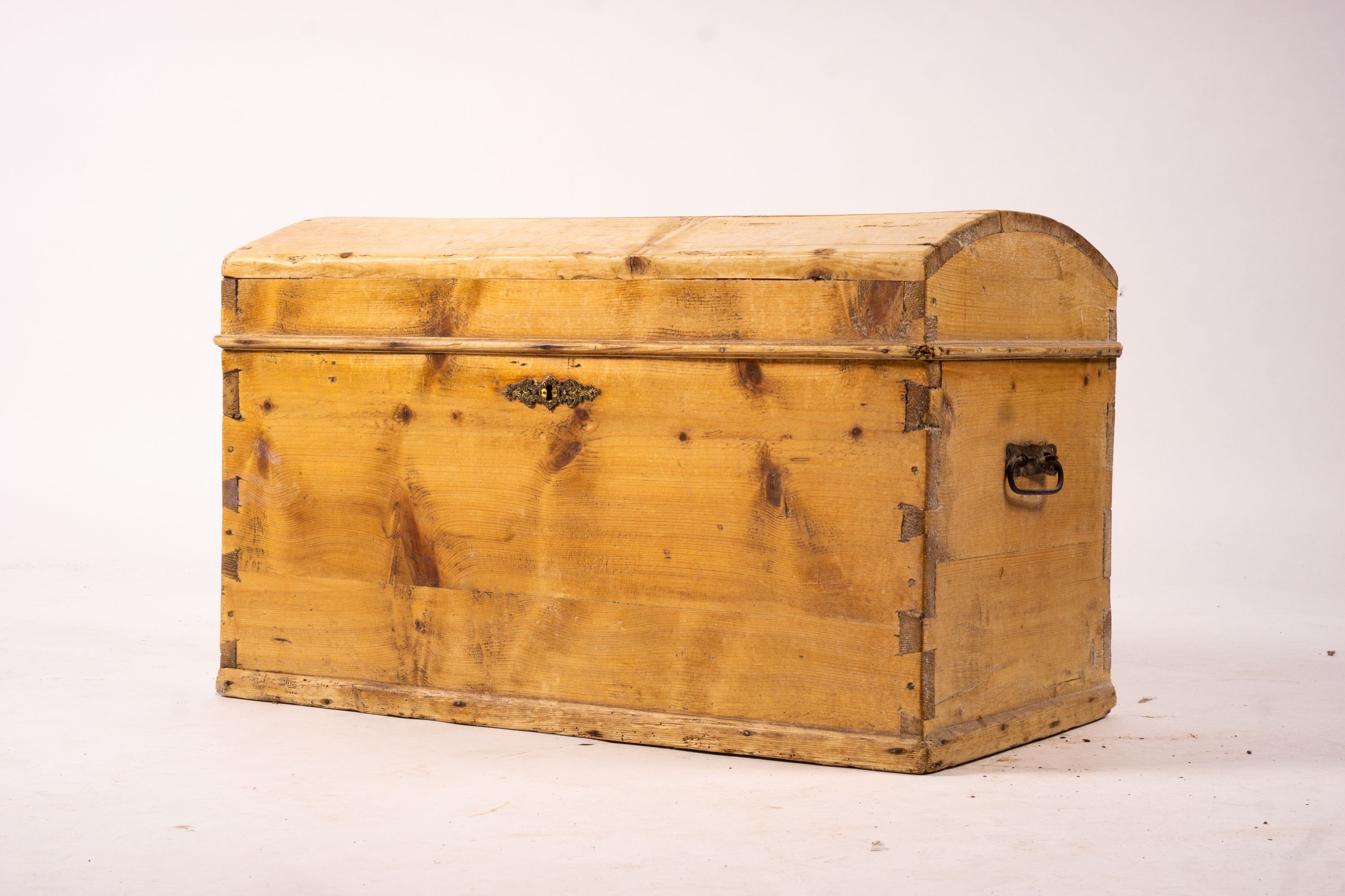 A small 19th century Continental pine domed top trunk, length 74cm, width 40cm, height 46cm